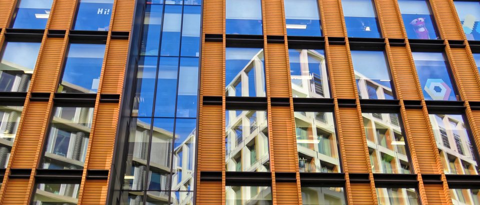 The terracotta and glass facade of Google's building at 6 Pancras Square, King's Cross